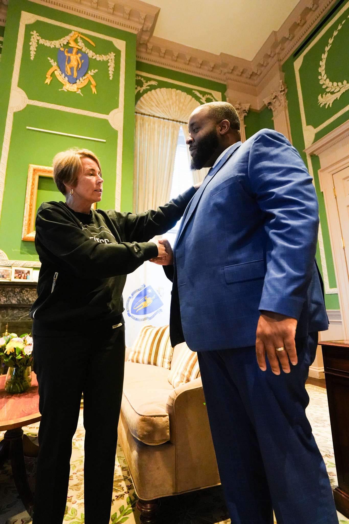 Chris Worrell with Governor Maura Healey at Uphams Corner